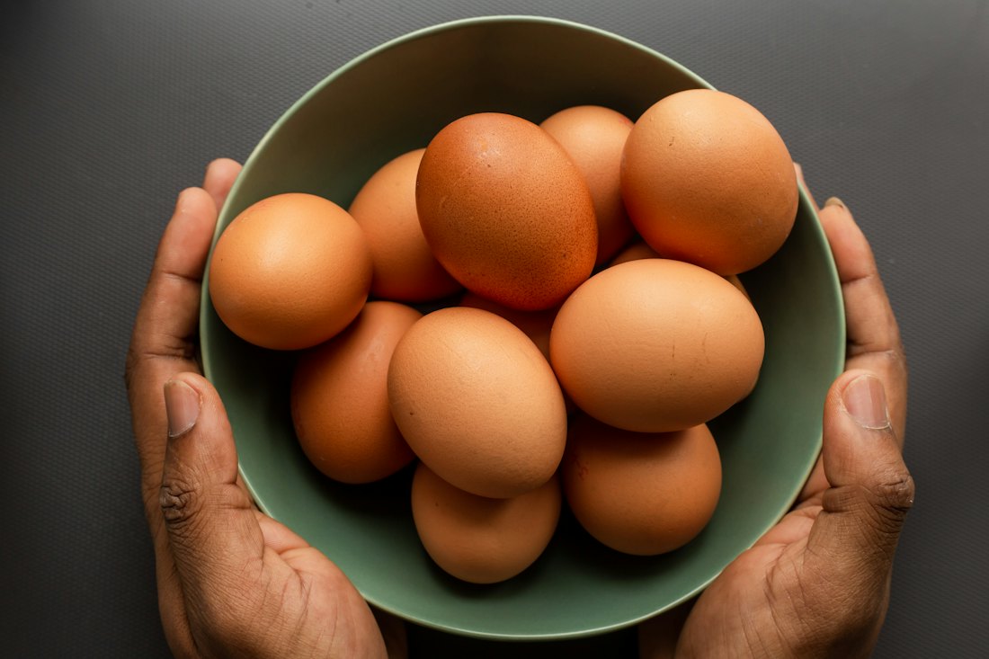 A bowl of fresh brown eggs
